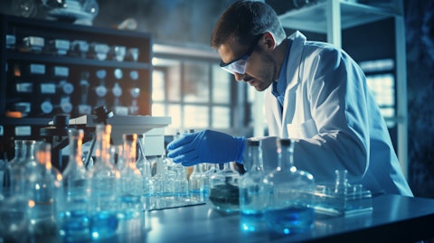 A scientist examining the results of a Phase III clinical trial for non-alcoholic steatohepatitis.