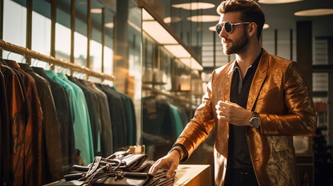 A customer in a store trying on fashionable apparel and accessories for purchase.