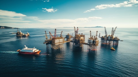 An aerial view of offshore rigs with oil storage tanks, reflecting the company's marine infrastructure.
