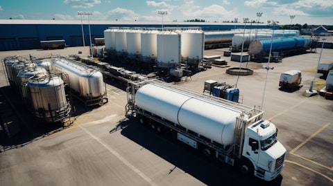 An aerial view of an industrial facility with a variety of water products being loaded into tanker trucks.