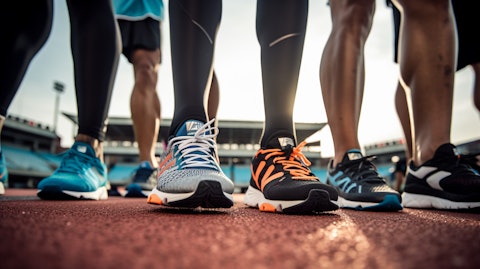 A team of athletes showcasing the company's athletic footwear in an outdoor stadium.