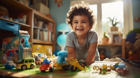 A child playing with their toy in their home, showing their joy for Hasbro products.