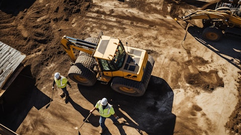 An overhead shot of a ProSolutions employee in the process of delivering equipment to a construction site.