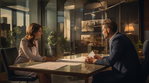 A woman discussing her mortgage plan with a banker in the office of the bank.