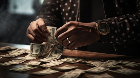 A close-up of hands counting bills, depicting the payment services the company offers.