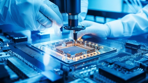A close-up of an engineer working on precision semiconductor chip fabrication.