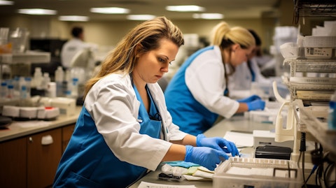 Clinical laboratory technicians running tests in the comprehensive kidney care services.