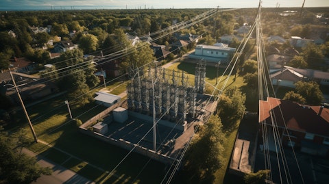 An aerial view of a large power substation, standing tall in a residential neighbourhood.