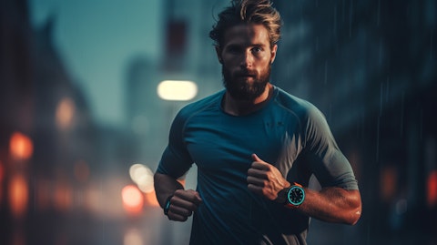 A marathon runner wearing a company branded smartwatch, monitoring his performance in real-time.