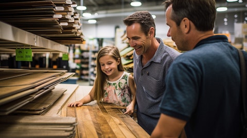 A family selecting a wood and wire closet organization in a home improvement store.