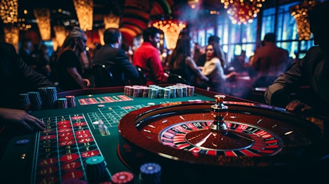 A bustling casino table surrounded by players, highlighting the gaming entertainment offered by the resort.