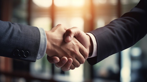 A corporate CEO shaking hands with a new executive, signifying a successful executive search.