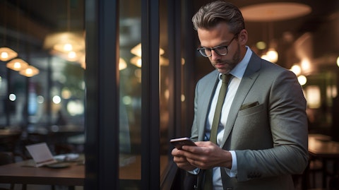 A successful business person confidently managing their finances on a mobile device.