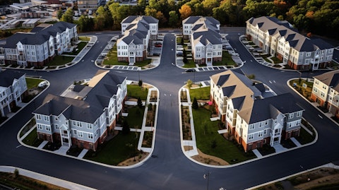 Aerial view of a newly built apartment community owned by the Real Estate Investment Trust.