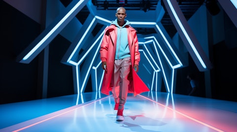 A model walking down the runway wearing a fashionable and performance-based apparel designed by the company.