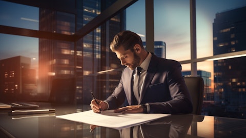 An executive in a suit examining a real estate loan contract, reflecting the commitment to financial services.