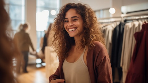 A close-up of a customer trying on a stylish Aerie item, smiling with satisfaction.