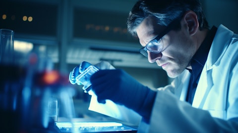 A technician in a lab coat examining a specimen on a Molecular Solutions rapid test.