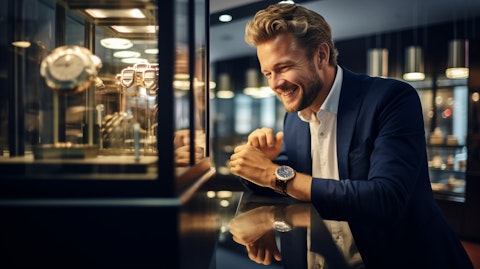 A smiling customer examining a finely crafted luxury watch in a specialty store.
