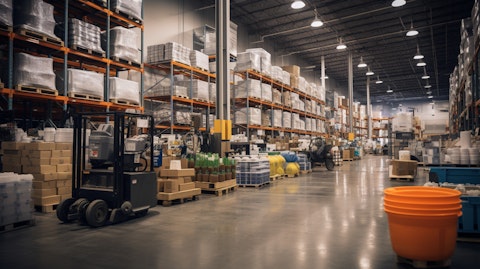 A bustling warehouse stocked with irrigation supplies, fertilizer, grass seed, ice melt products, pesticides, and landscape accessories.