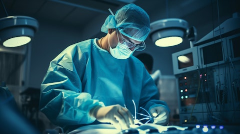A surgeon in a modern operating theatre performing a transplant surgery with medical technology.
