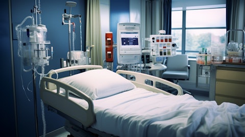 A hospital room with a patient using a medical device to administer insulin.