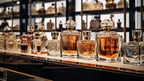 A shelf of luxurious perfumes in an upmarket department store surrounded by satisfied customers.