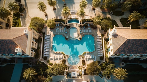 Aerial view of a luxury hotel, representing the company's premium quality offerings.