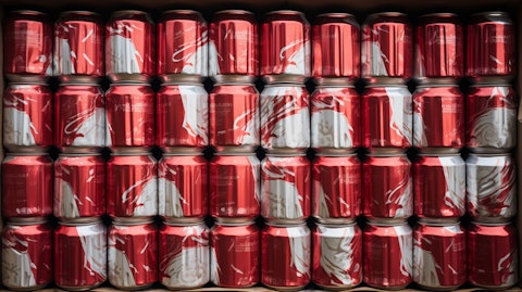 A shipping container filled with freshly-produced aluminum cans ready for distribution.