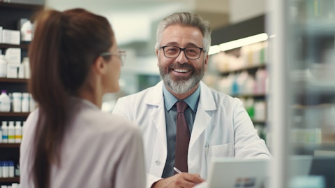A pharmacist discussing over-the-counter health products with a customer.