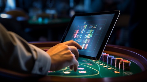 A close-up of a customer playing a gambling game on a computer tablet.
