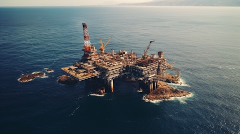 An aerial view of an oil and gas platform in the middle of the ocean, representing the massive resources harvested by the company.