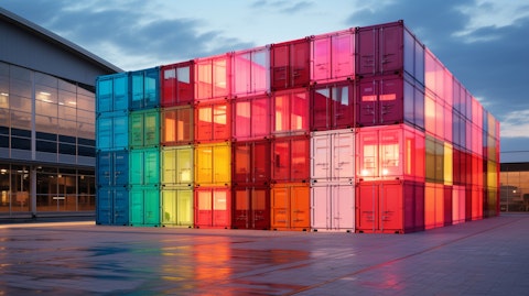 A containerboard factory with a display of multi-color boxes at the entrance.
