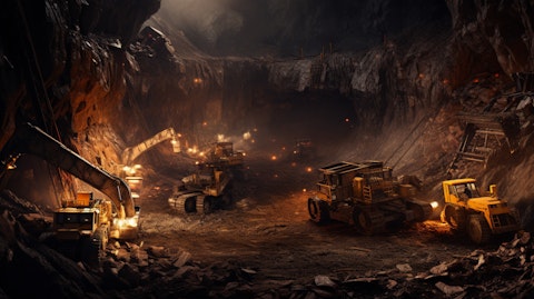 An underground mine filled with heavy machinery digging up valuable minerals.
