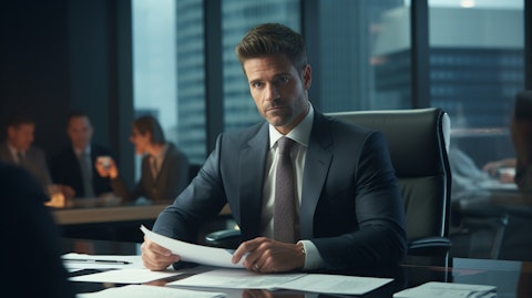 A professional in business attire discussing finances in a boardroom.