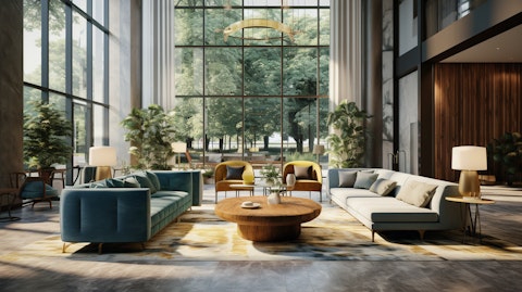 A high-end hotel lobby, with modern furnishings, lush carpeting, and natural light.