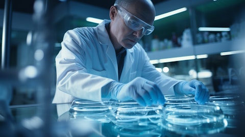 A scientist conducting research in a laboratory, studying a Petri dish with advanced biopharmaceuticals.