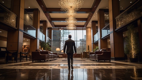 An executive in a suit walking through a lobby of *Regional Bank* building.