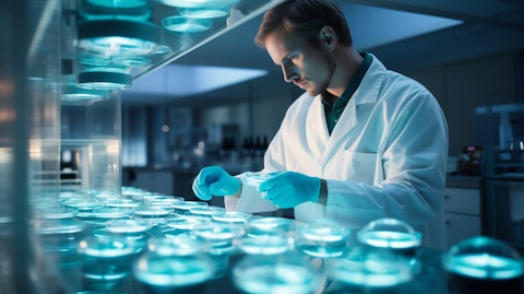 A doctor in a lab coat examining a petri dish, with a focus on biopharmaceuticals.