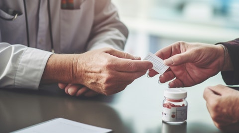 A medical professional administering a prescription pain management medication to a patient.