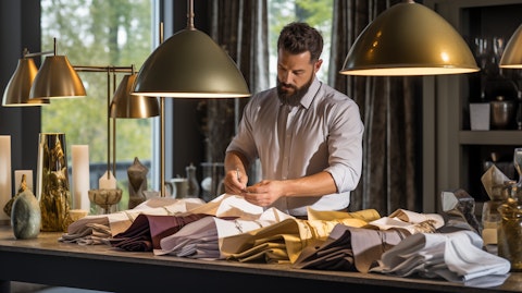 A professional interior designer selecting items from the company including textiles, accessories, and outdoor lighting.