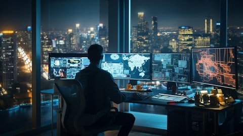 A software engineer working intently at a computer desk, surrounded by the latest technologies.