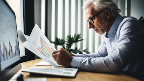 A financial analyst pouring over graphs and charts related to annuities and fixed index annuities.