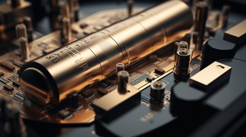 A close-up of a battery cell being assembled with intricate precision.