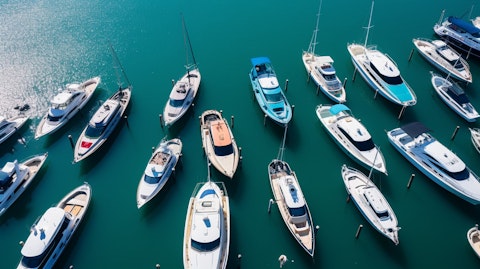 An aerial view of boat show with recreational boats and luxury day boats on display.