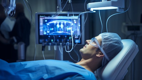 A technician using an ENHANCE Transcarotid Peripheral Access Kit to perform a procedure.