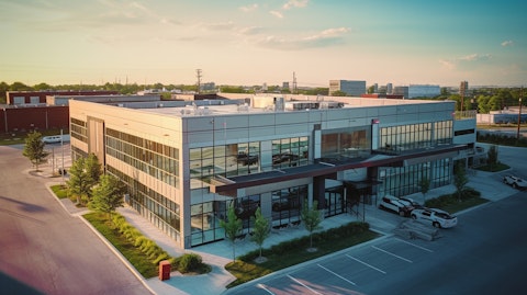 An aerial view of a industrial-style building, reflecting the company's success in real estate investments.