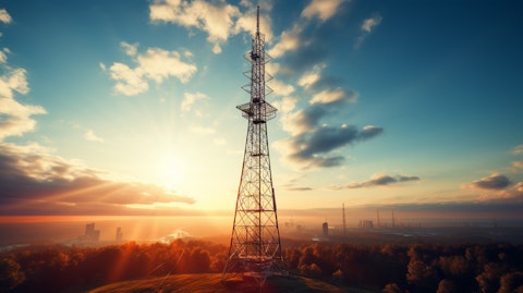 A radio tower with a setting sun in the background, symbolizing the power of broadcasting.