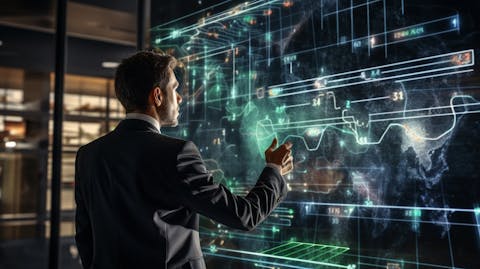 A successful businesswoman pointing to a digital chart with her team in the background, highlighting the organization's investment advice and digital offerings.