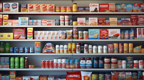 A supermarket shelf overflowing with a variety of fast-moving consumer goods.